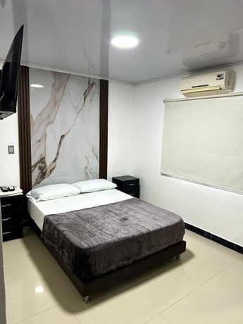 Imagen de la habitación del Hotel Brisas Del Mar Suite. Foto 9