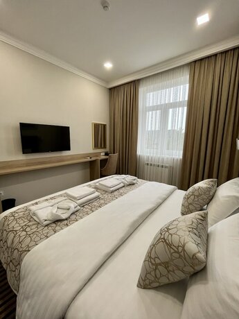 Imagen de la habitación del Hotel Bristol Tashkent. Foto 17