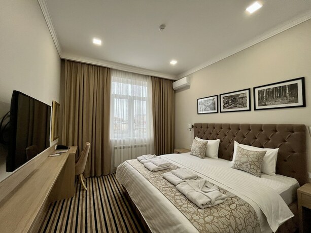 Imagen de la habitación del Hotel Bristol Tashkent. Foto 20