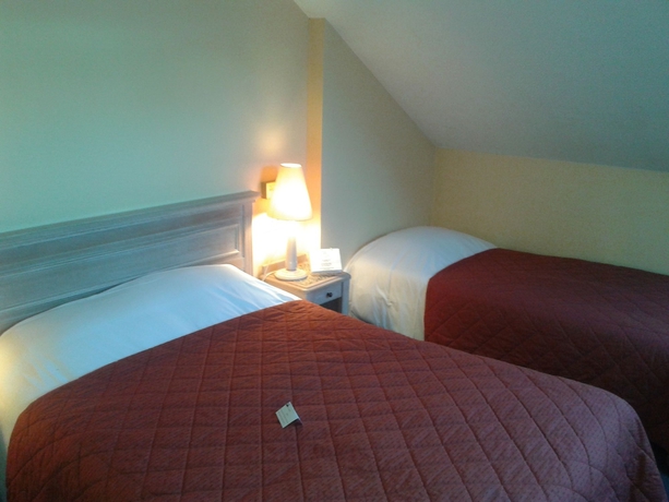 Imagen de la habitación del Hotel Brit Aux Sacres. Foto 10