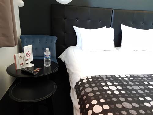 Imagen de la habitación del Hotel Brit Baillet En France. Foto 9