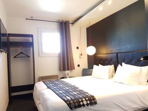 Imagen de la habitación del Hotel Brit Baillet En France. Foto 10