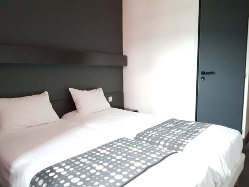 Imagen de la habitación del Hotel Brit Baillet En France. Foto 11