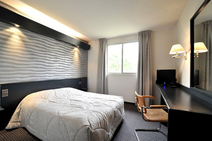Imagen de la habitación del Hotel Brit Balladins Villefranche-de-rouergue. Foto 4