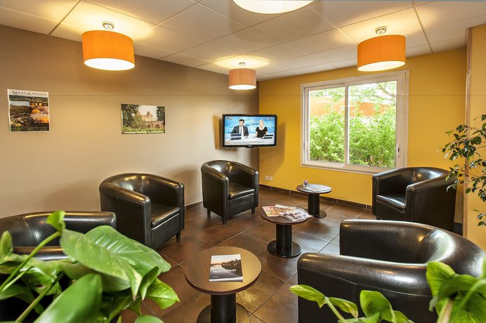 Imagen del bar/restaurante del Hotel Brit Confort Montauban. Foto 3