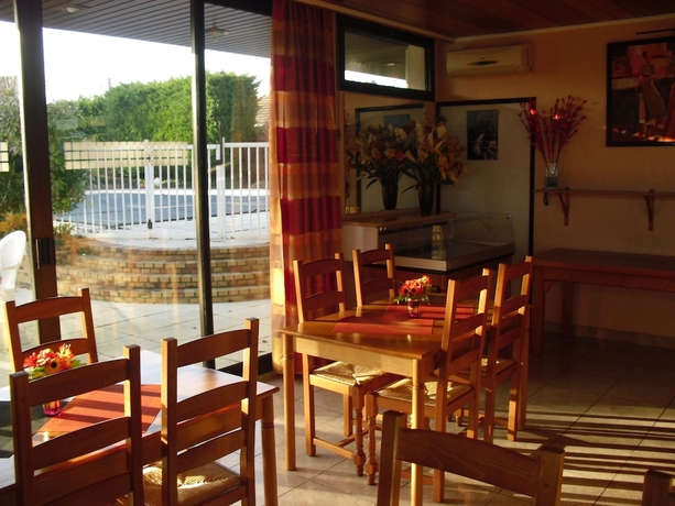 Imagen del bar/restaurante del Hotel Brit Dak'h&ocirc;tel. Foto 3
