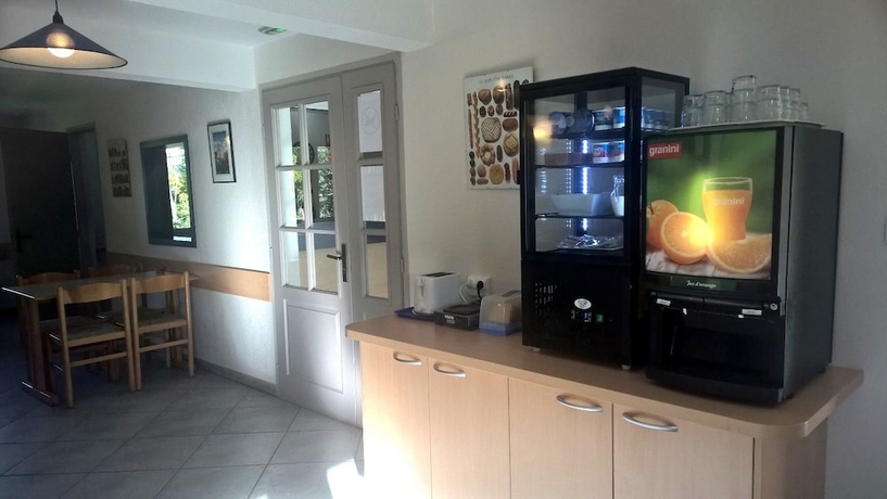 Imagen del bar/restaurante del Hotel Brit Deltour Essentiel Mende. Foto 7