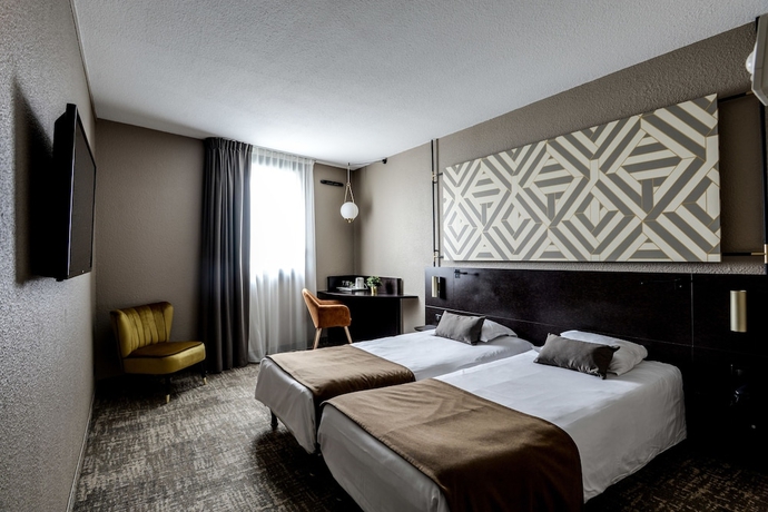 Imagen de la habitación del Hotel Brit Du Stade. Foto 6