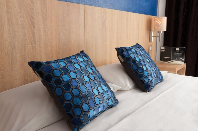 Imagen de la habitación del Hotel Brit Hôtel De L'océan. Foto 8