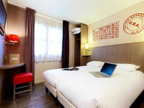 Imagen de la habitación del Hotel Brit Hotel Essentiel Cholet. Foto 13