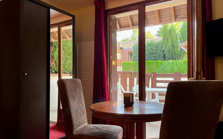 Imagen de la habitación del Hotel Brit Hotel Romantica. Foto 16