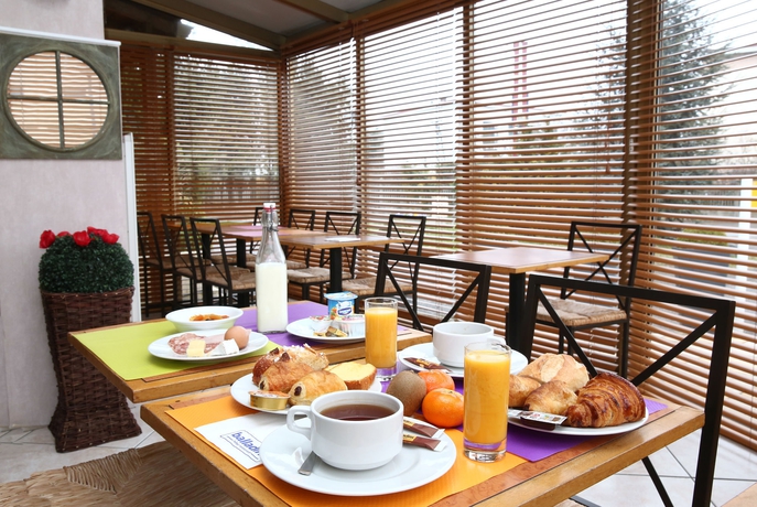 Imagen del bar/restaurante del Hotel Brit Lyon Eurexpo. Foto 5