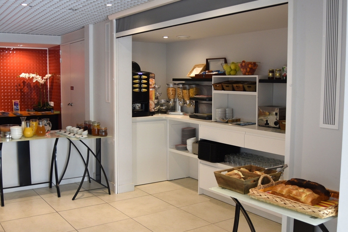 Imagen del bar/restaurante del Hotel Brit Porte D’espagne. Foto 5