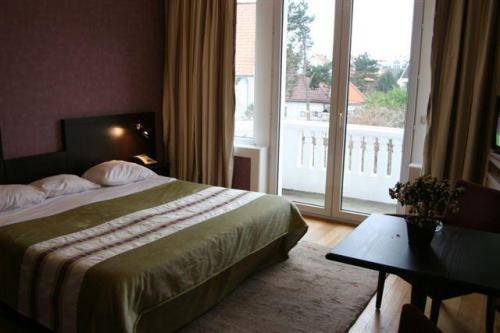 Imagen de la habitación del Hotel Britannia, KNOKKE-HEIST. Foto 11