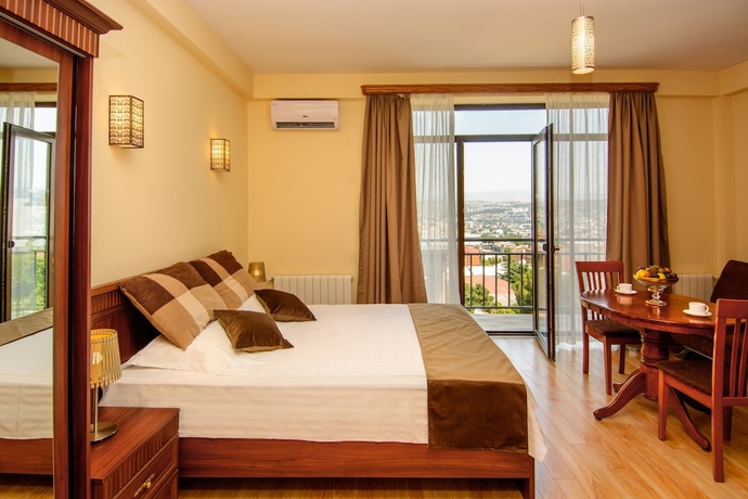 Imagen de la habitación del Hotel British House. Foto 7