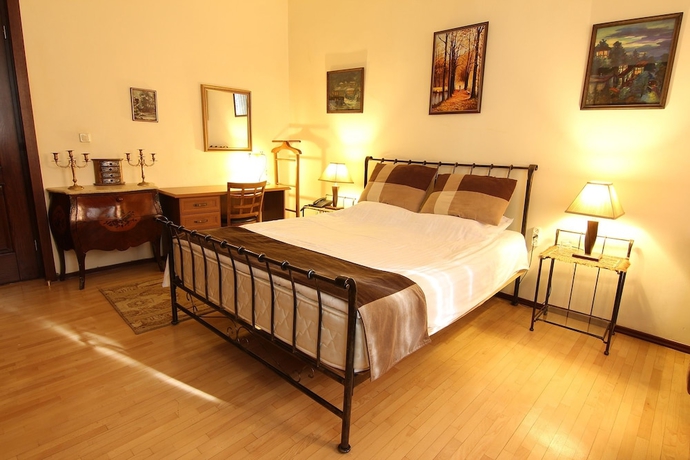 Imagen de la habitación del Hotel British House. Foto 11
