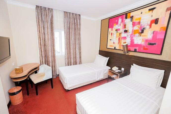 Imagen de la habitación del Hotel Brits Pangkalan Bun. Foto 16