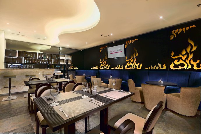 Imagen del bar/restaurante del Hotel Brits Puri Indah. Foto 3