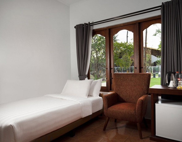 Imagen de la habitación del Hotel Brits Resort Lovina. Foto 7