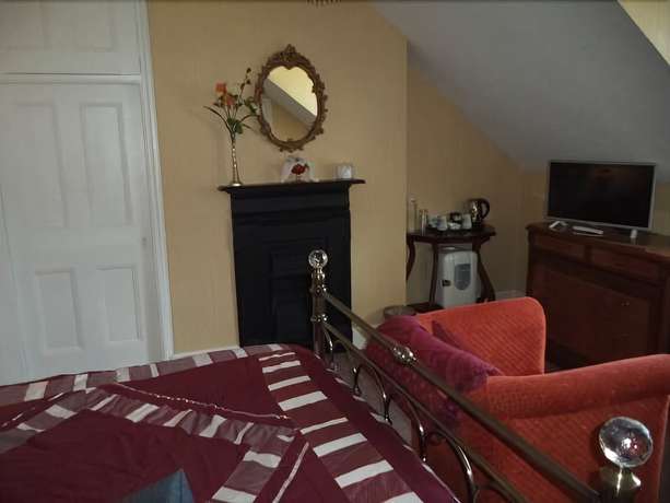 Imagen de la habitación del Hotel Britten House. Foto 8
