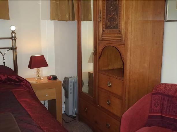 Imagen de la habitación del Hotel Britten House. Foto 11
