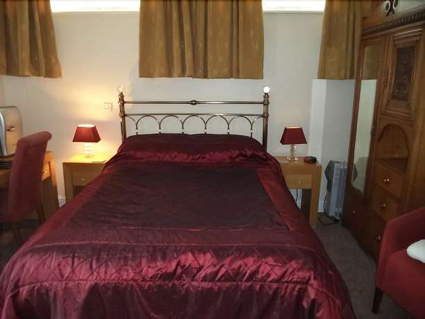 Imagen de la habitación del Hotel Britten House. Foto 15