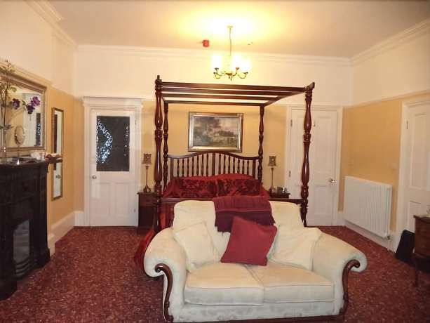 Imagen de la habitación del Hotel Britten House. Foto 17