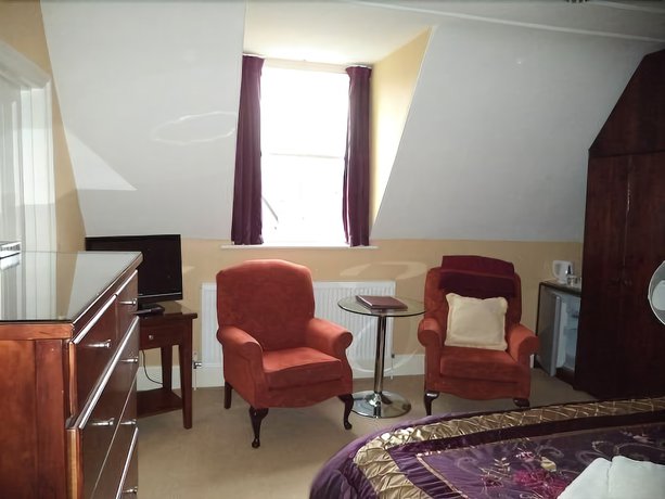 Imagen de la habitación del Hotel Britten House. Foto 19