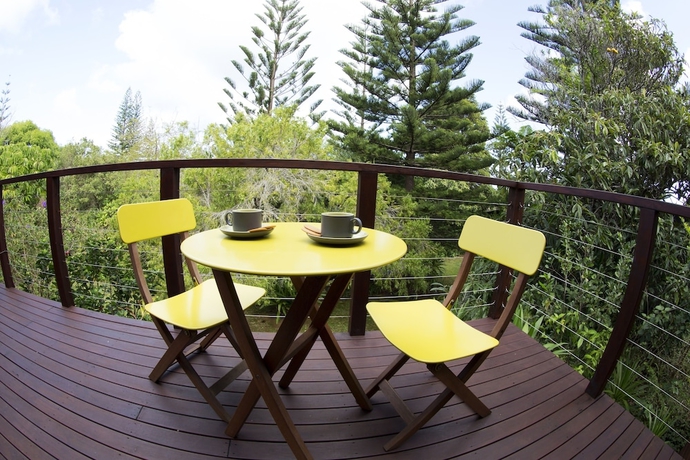 Imagen de la habitación del Hotel Broad Leaf Villas. Foto 8