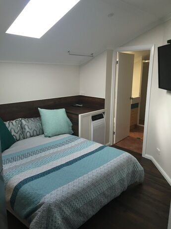 Imagen de la habitación del Hotel Broadbeach Studios. Foto 23