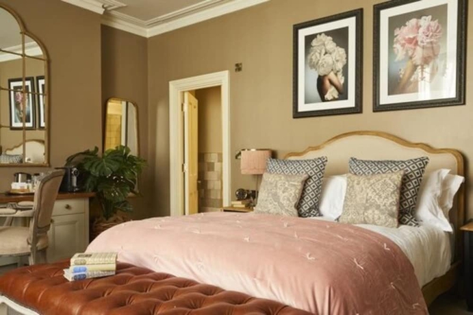 Imagen de la habitación del Hotel Broadstreet Townhouse. Foto 10