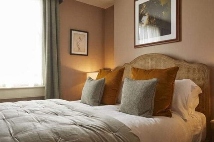 Imagen de la habitación del Hotel Broadstreet Townhouse. Foto 11