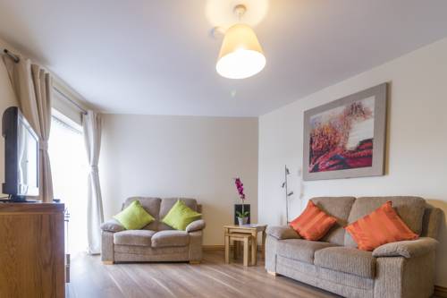 Imagen de la habitación del Hotel Broc House Suites. Foto 3