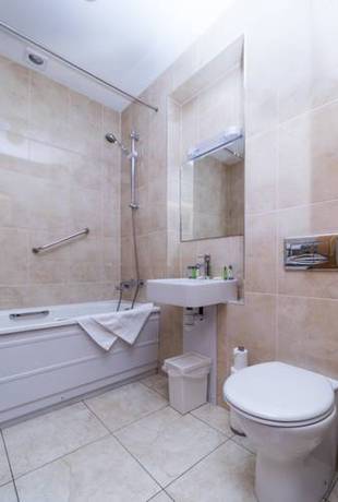 Imagen de la habitación del Hotel Broc House Suites. Foto 4