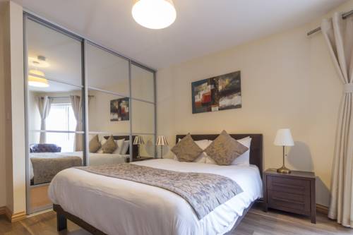 Imagen de la habitación del Hotel Broc House Suites. Foto 7