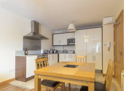 Imagen de la habitación del Hotel Broc House Suites. Foto 8