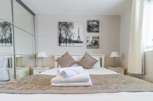 Imagen de la habitación del Hotel Broc House Suites. Foto 13