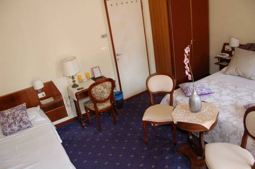 Imagen de la habitación del Hotel Broglia. Foto 16