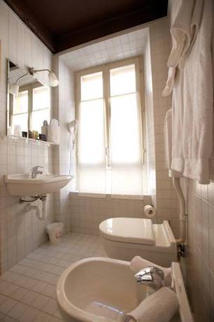 Imagen de la habitación del Hotel Broletto. Foto 16