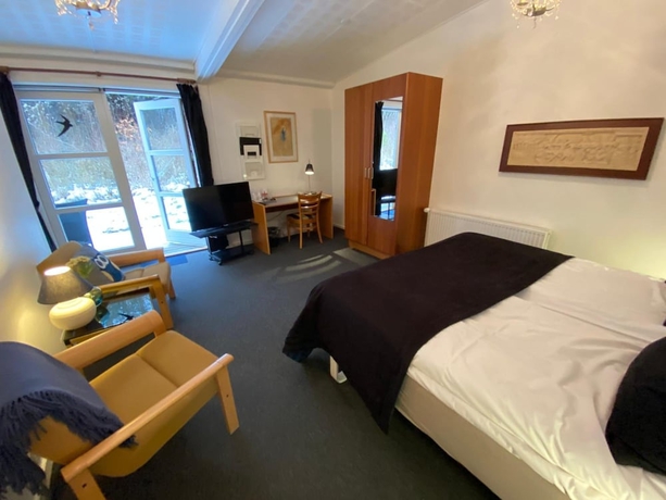 Imagen de la habitación del Hotel Brom&oslash;lle Kro. Foto 16
