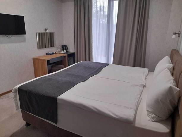 Imagen de la habitación del Hotel Brooch Boutique. Foto 6