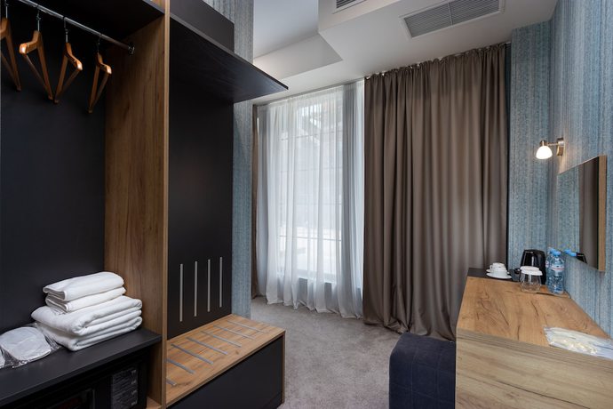 Imagen de la habitación del Hotel Brooch Boutique. Foto 10