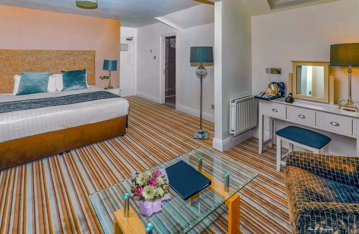 Imagen de la habitación del Hotel Brook Lodge Boutique. Foto 5