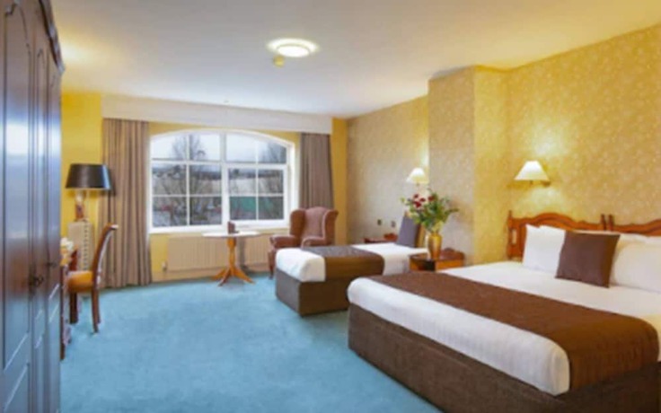 Imagen de la habitación del Hotel Brook Lodge Boutique. Foto 12