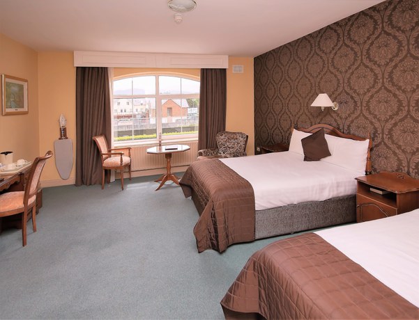 Imagen de la habitación del Hotel Brook Lodge Boutique. Foto 14