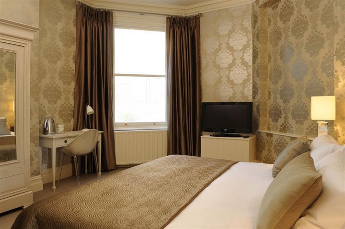 Imagen de la habitación del Hotel Brooks Guesthouse. Foto 5