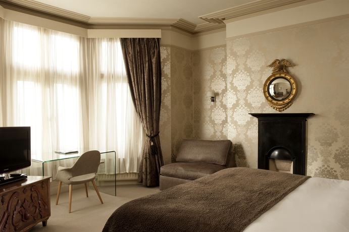 Imagen de la habitación del Hotel Brooks Guesthouse. Foto 8