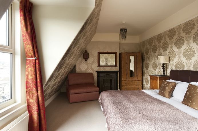 Imagen de la habitación del Hotel Brooks Guesthouse. Foto 10