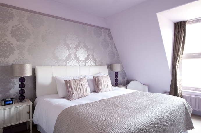 Imagen de la habitación del Hotel Brooks Guesthouse. Foto 12