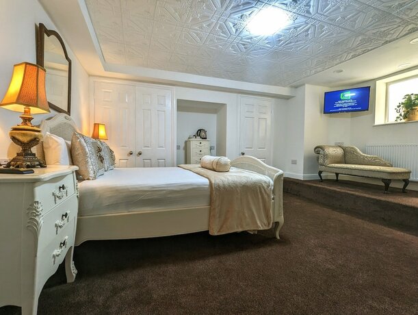 Imagen de la habitación del Hotel Brookside. Foto 17